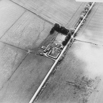 Oblique aerial view of the farmsteading, taken from the NE