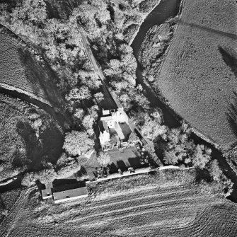 Oblique aerial view centred on the tower-house, taken from the WSW.