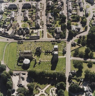 Oblique aerial view centred on the remains of the cathedral and Chapter House, taken from the N.