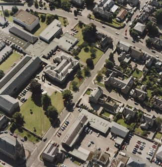 Oblique aerial view centred on the college, taken from the NE.