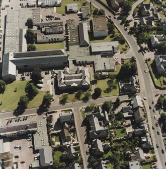 Oblique aerial view centred on the college, taken from the NNW.