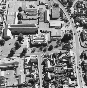 Oblique aerial view centred on the college, taken from the NW.