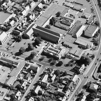 Oblique aerial view centred on the college, taken from the NW.