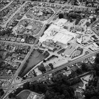 Oblique aerial view centred on the hospitals, taken from the NNE.