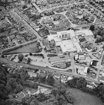 Oblique aerial view centred on the hospitals, taken from the N.
