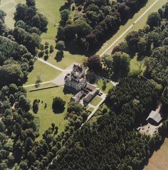 Oblique aerial view centred on the country house, taken from the NNE.