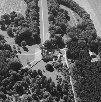Oblique aerial view centred on the country house, taken from the NW.