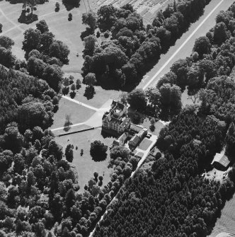 Oblique aerial view centred on the country house, taken from the NE.