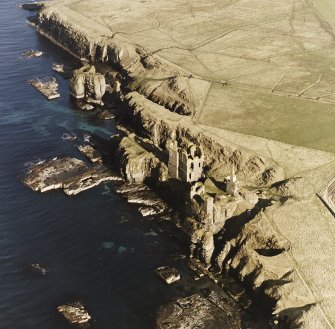 Aerial photograph showing castles Girnigoe and Sinclair, Castle Haven Dyke and Noss 
Head, North Mounds