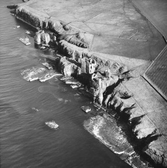 Aerial photograph showing Castles Girnigoe, Sinclair, Castle Haven Dyke and Noss Head,
North mounds
