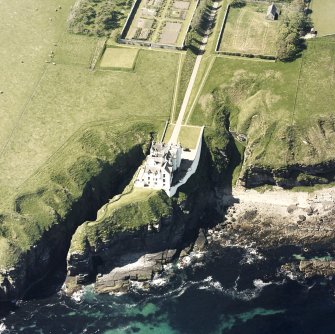 Aerial view of Dunbeath Castle and walled gardens from E.