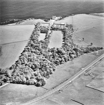 Aerial view of Dunbeath Castle and grounds from the NW.