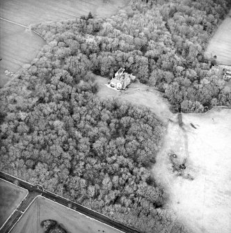 Oblique aerial view centred on the country house, taken from the S.