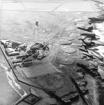 Oblique aerial view of the radio station and the remains of the chapel and the graveyard, taken from the NE.