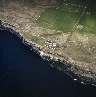 Oblique aerial view centred on the lighthouse, taken from the ESE.