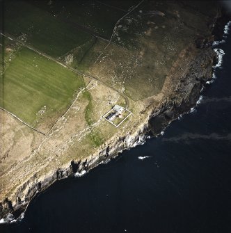 Oblique aerial view centred on the lighthouse, taken from the S.