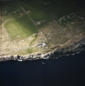 Oblique aerial view centred on the lighthouse, taken from the SSE.