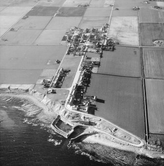 Aerial photograph showing harbour and village