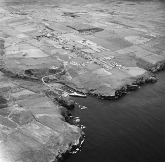 Lybster, oblique aerial view, taken from the SW, showing Lybster village and harbour.