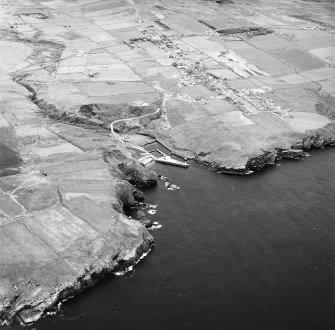 Lybster, oblique aerial view, taken from the SW, showing Lybster village and harbour.