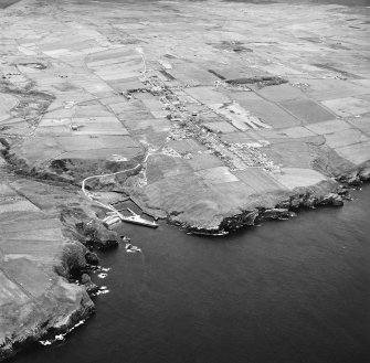 Lybster, oblique aerial view, taken from the SW, showing Lybster village and harbour.