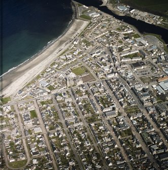 General oblique aerial view of Thurso centred churches with the harbour adjacent, taken from the WSW.