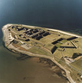 Oblique aerial view centred on the barracks, taken from the SE.