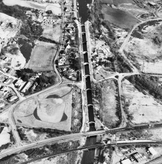 Oblique aerial view showing Neptune's Staircase, Banavie Swing Bridge and Banavie Railway Swing Bridge.