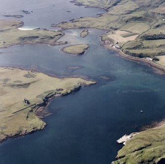 Canna and Sanday. Aerial view of Roman Catholic Church of St Edward the Confessor and Canna Harbour, pier with nearby sites, buildings and monuments at Eilean a' Bhaird, Eilean Gille Mhartein, Changehouse, The Square, Camas an Ail, Greod, Cnoc an Tionail, Am Mialagan, Rubha an Feannag, Rubha nan Lion and Druim an Lochain.