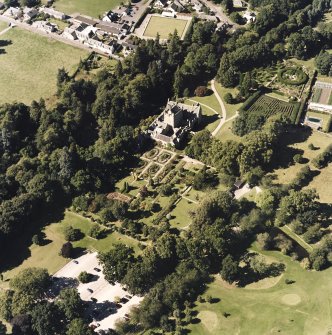 Oblique aerial view centred on the castle and walled garden, taken from the SE.