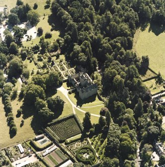 Oblique aerial view centred on the castle and walled garden, taken from the NNE.
