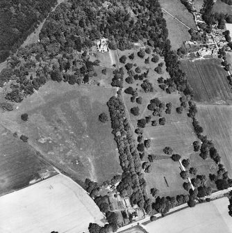 Castle Leod.
Oblique aerial view, taken from the SSE, showing the tower-house, a possible golf course and the gatelodge.