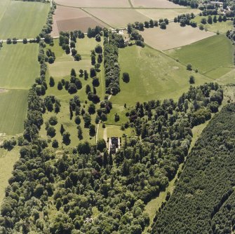 Castle Leod.
Oblique aerial view, taken from the NW, showing the tower-house and a possible golf course.