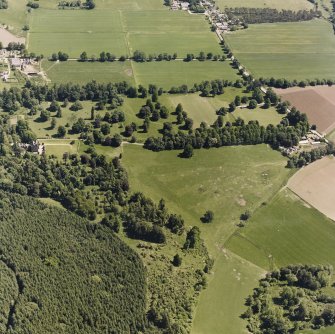 Castle Leod.
Oblique aerial view, taken from the SW, showing the tower-house and a possible golf course.