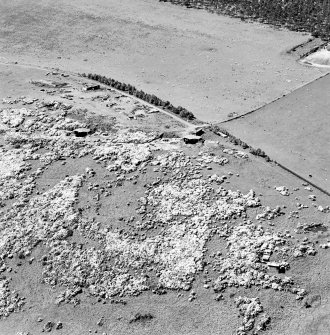 Aerial view of North Sutor coast battery with First and Second World War gun-emplacements, from the SE.