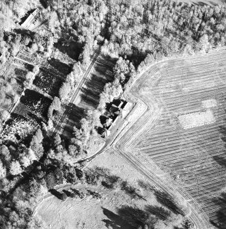 Oblique aerial view centred on the dairy, taken from the SW.