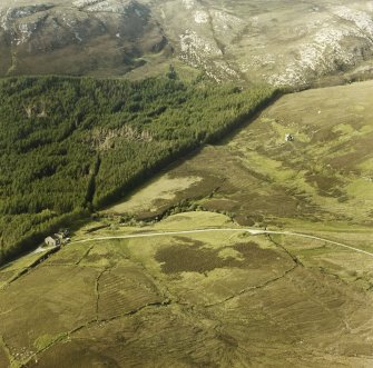 Oblique aerial view of No. 1 mine, blowing engine house and surface buildings, Raasay.