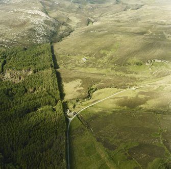 Oblique aerial view of No. 1 mine, blowing engine house and surface buildings, Raasay.