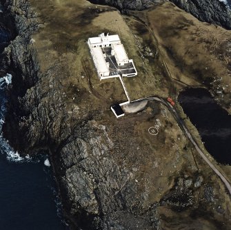 Oblique aerial view centred on the lighthouse, taken from the S.