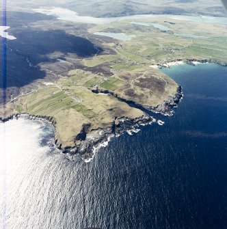 General oblique aerial view looking across the crofting townships, cave and the remains of the radar station towards the Kyle of Durness, taken from the E.