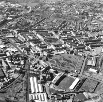 Oblique aerial view showing Easter Road, Eastern Cemetery and Albion Road, Easter Road Stadium