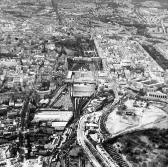 Aerial view showing Canongate and Calton Hill at bottom of photograph, Greyfriars Churchyard to left, Murrayfield Stadium at top and New Town to right