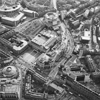 Oblique aerial view of Edinburgh centred on the Clydesdale Bank Plaza and Standard Life building, taken from the NE.