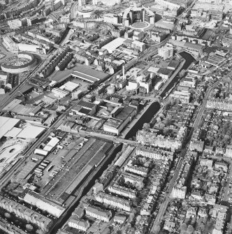 Oblique aerial view of Edinburgh centred on the Fountain Brewery and the Union Canal, taken from the SSW.