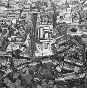 Oblique aerial view of Edinburgh centred on the Museum of Scotland, taken from the WSW.