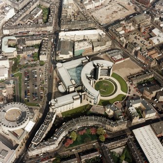 Oblique aerial view of Edinburgh centred on the Scottish Widows building with Gardners Crescent adjacent, taken from the W.