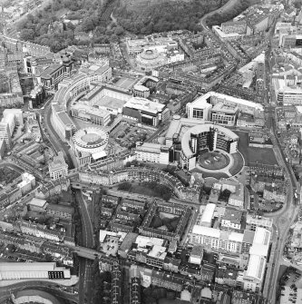 Oblique aerial view centred on The Exchange area of Edinburgh, taken from the SW.