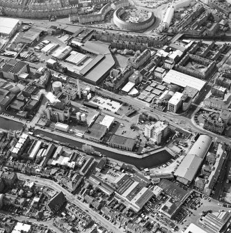 Oblique aerial view of Edinburgh centred on the Fountain Brewery, Fountainbridge, taken from the SE.
