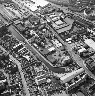 Oblique aerial view of Edinburgh centred on the Fountain Brewery, Fountainbridge, taken from the E.