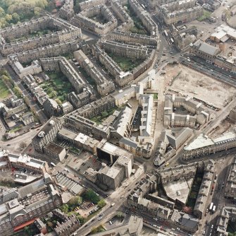 Oblique aerial view of Edinburgh centred on the Inland Revenue offices, Lauriston Place, taken from the NNE.